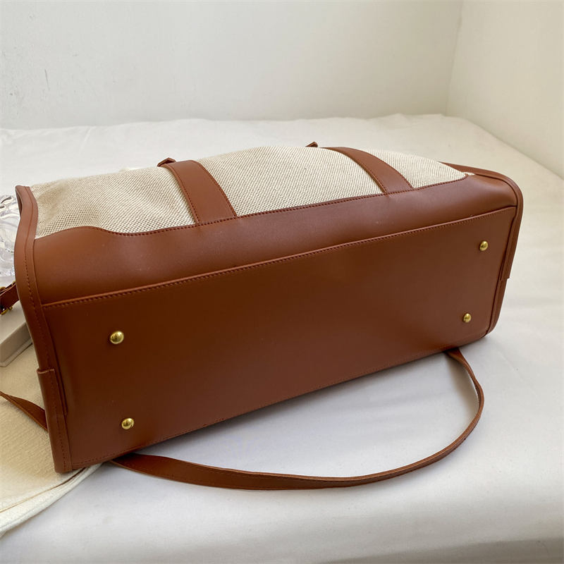 Brown leather bag bottom view