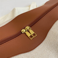 Brown leather bag with gold zipper