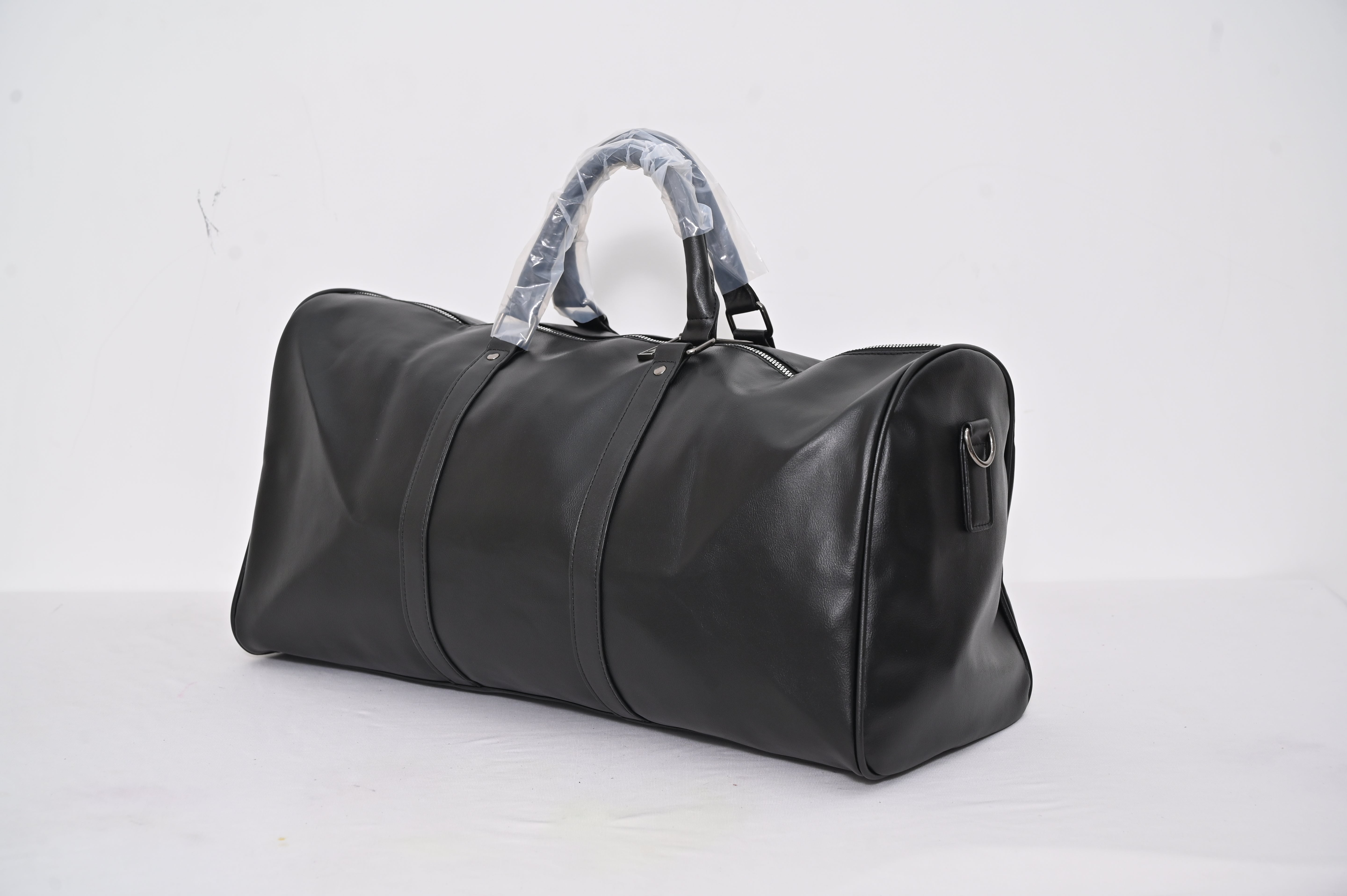Black leather duffel bag