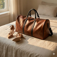 Brown leather duffel bag