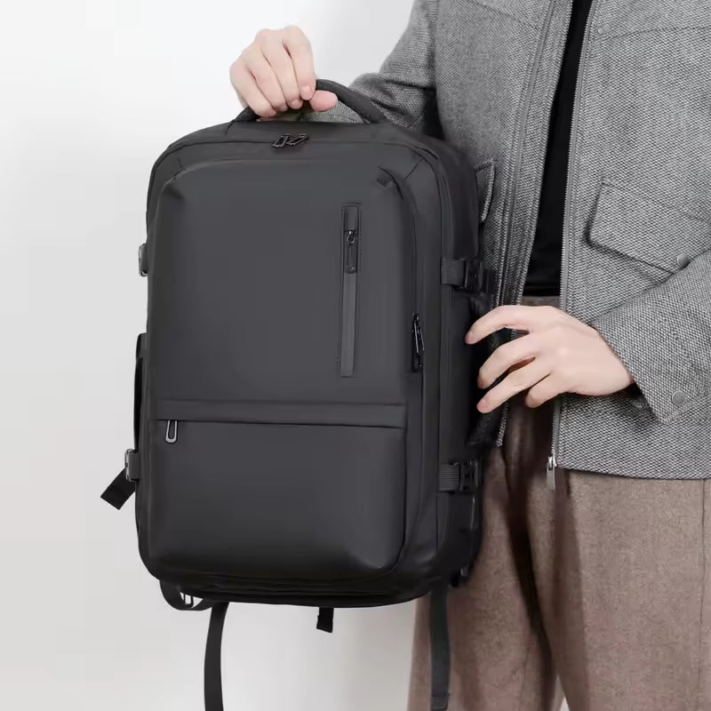 Person carrying Flex Shell Travel Laptop Backpack while travelling
