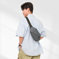 Person wearing ActiveGo Everyday Travel Sling Bag while travelling